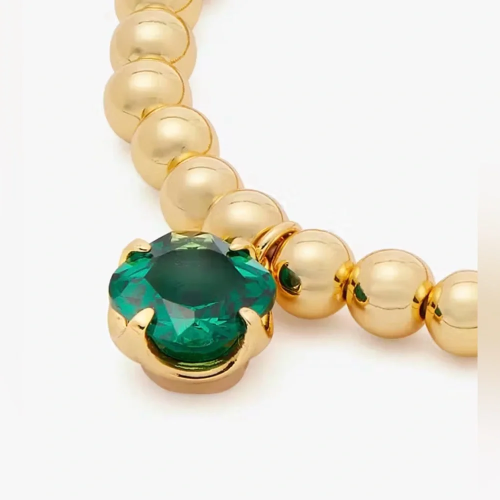 KATE SPADE Pop of Joy Gold Toned Stretch Bracelet in Emerald Green NWT